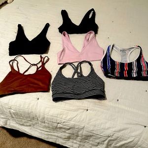 Sports bras size CS (3) and small (3)